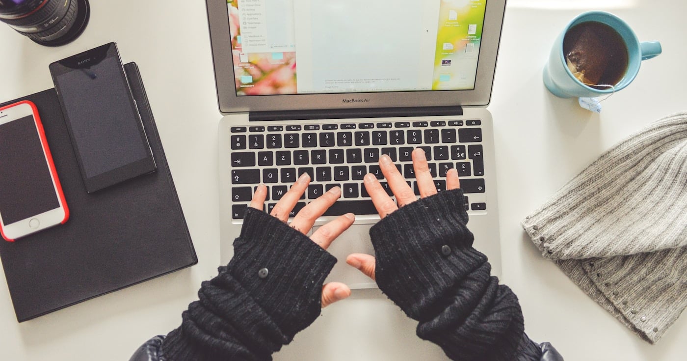 Person working on content strategy at laptop