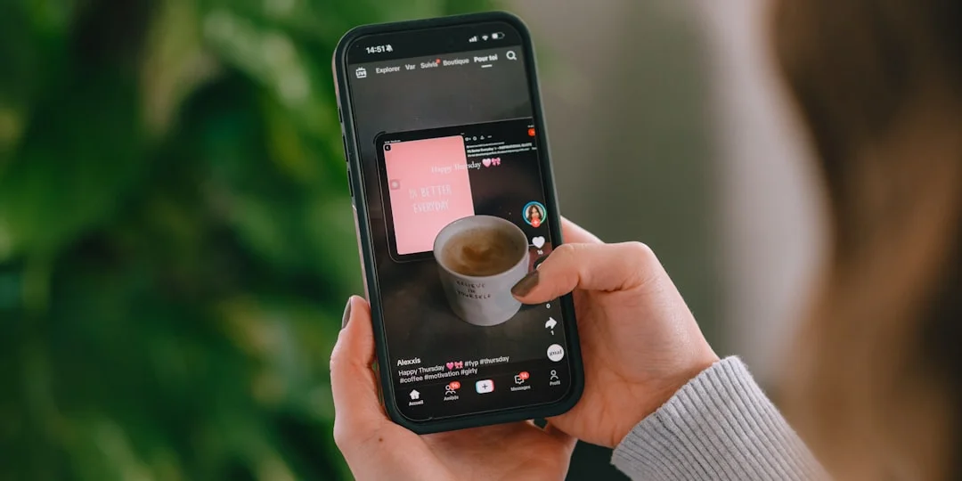 Person recording social media content on a smartphone for user-generated content